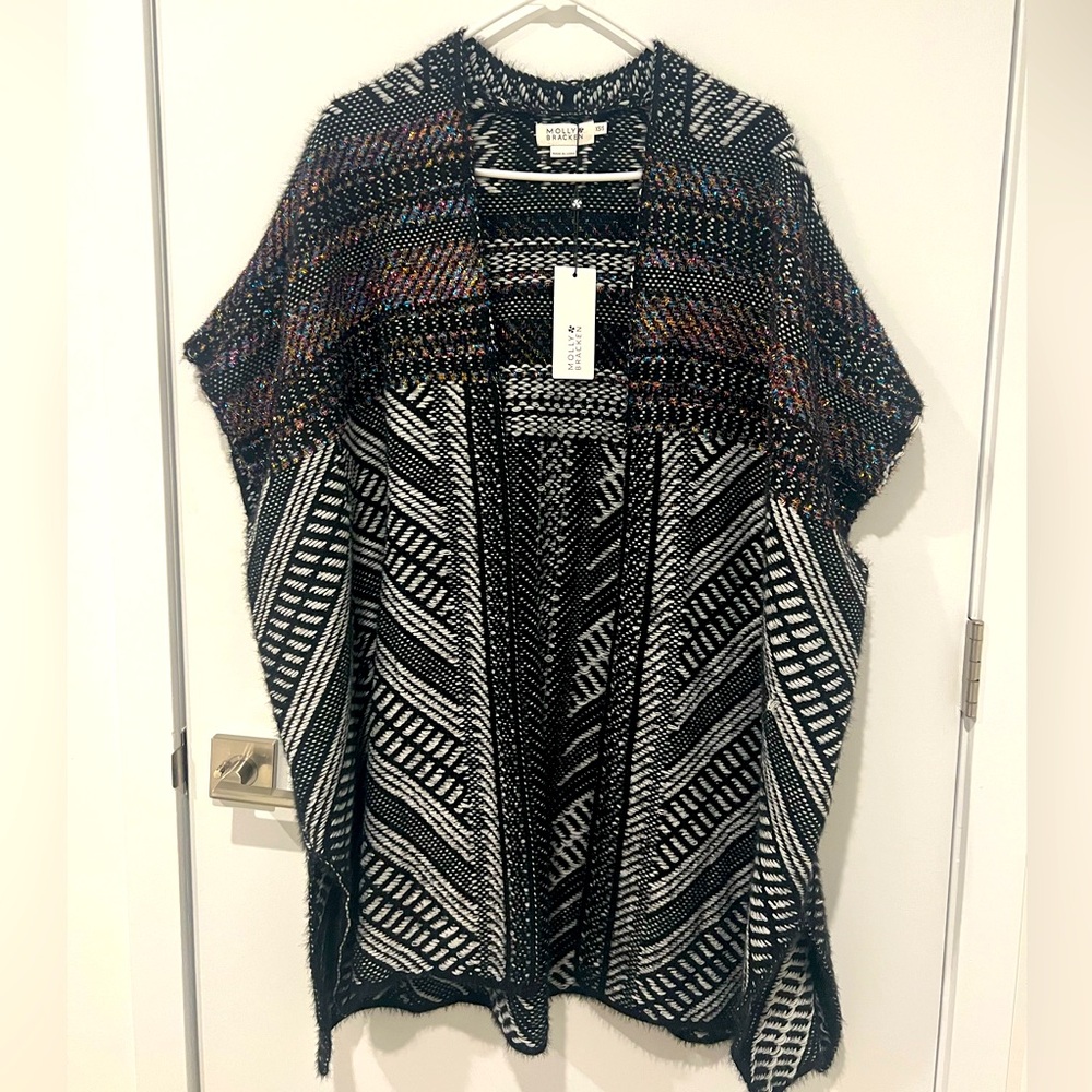 Molly Bracken Chic Black and White Knitted Poncho with rainbow metallic detail